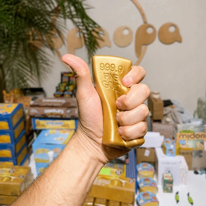 Auksinis luitas „Squishy Gold“ – minkštas antistresinis sensorinis gniuždomas žaislas